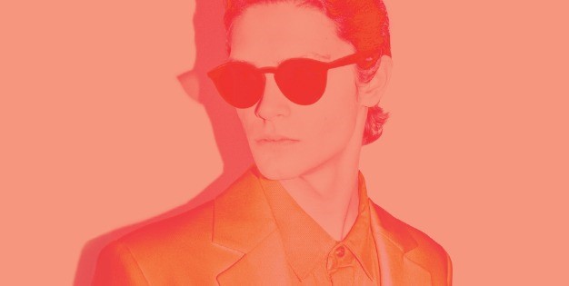 Male model in suit wearing sunglasses