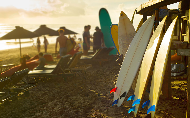 Colourful surfboards line the beach in Bali, Indonesia